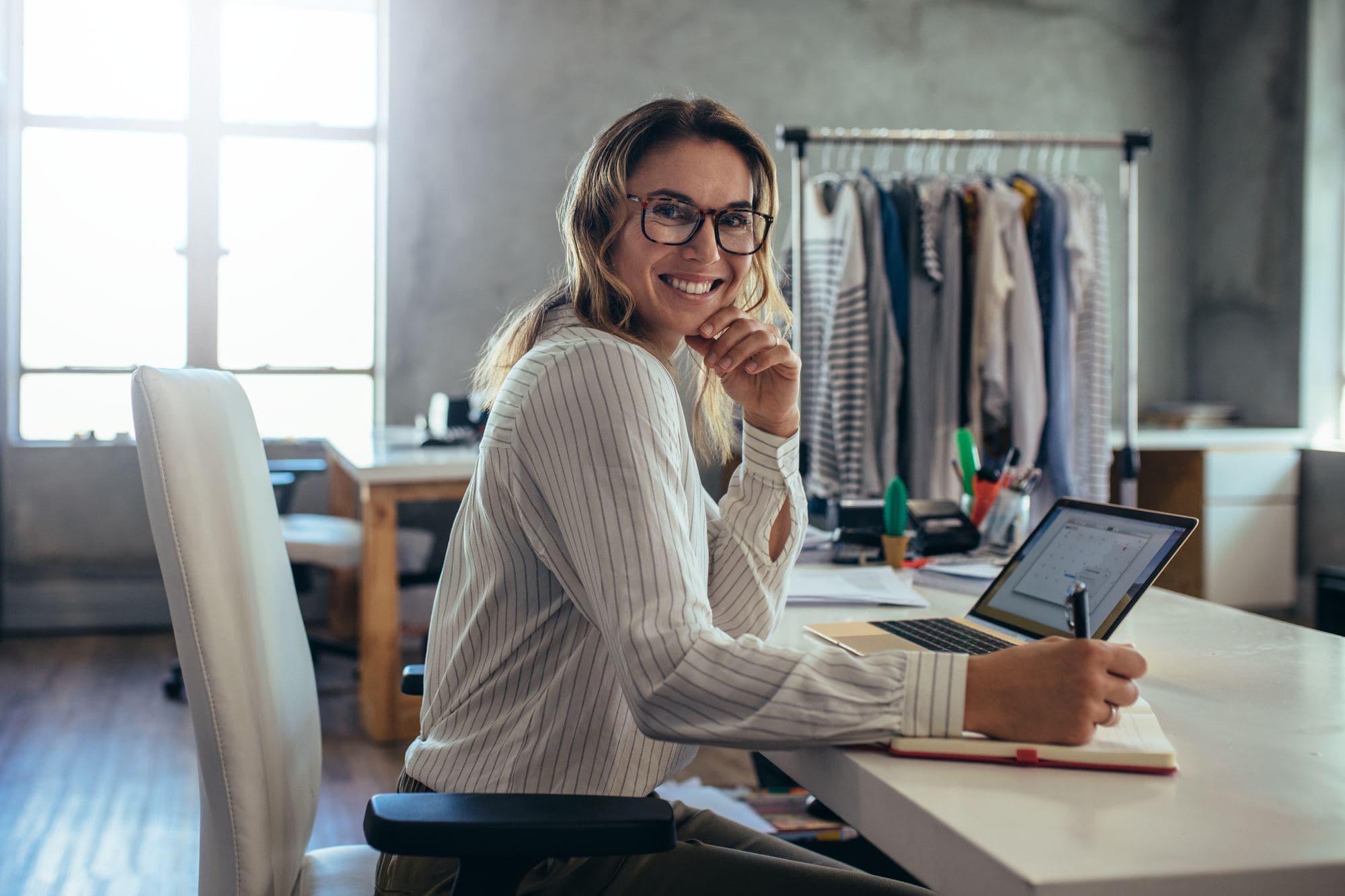 A small business owner at her desk
